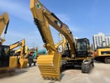 2024 Caterpillar 325DL crawler excavator, front three-quarter view