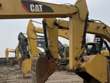 Caterpillar 329D crawler excavator, front-side view