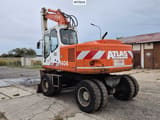 1995 Atlas 1404 wheel excavator, rear three-quarter view