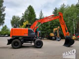 2016 Hitachi Zaxis 140W wheel excavator, side view