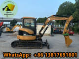 2010 Caterpillar 304CCR mini excavator, side profile view
