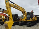 Komatsu PC210 LC crawler excavator, front three-quarter view