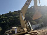 2022 Caterpillar 325B crawler excavator, side view