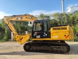 Caterpillar 312D crawler excavator, side profile view