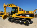 Koparka gąsienicowa Caterpillar 320CL z 2014 roku, widok z boku