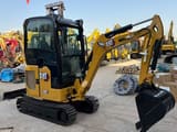 2024 Caterpillar 302 mini excavator, three-quarter view