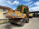1992 Atlas AB 1604 wheel excavator, rear three-quarter view