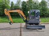 2022 CASE CX60C mini excavator, side view