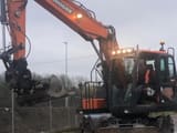 2019 Doosan DX140W-5 wheel excavator, front view