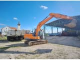 Doosan DX140LC-5 crawler excavator, side view