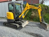2021 New Holland E26C mini excavator, side view