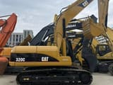 2025 Caterpillar 320C crawler excavator, side profile view