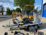 Berger Kraus BK1000JS mini excavator on a trailer, side view