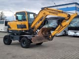 2014 Hyundai R55W-9 wheel excavator, side view