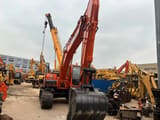 2022 Doosan DX225LC crawler excavator, front three-quarter view