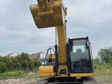 2024 Caterpillar 320GC crawler excavator, front view