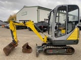 2014 Wacker Neuson 1404 mini excavator, side view