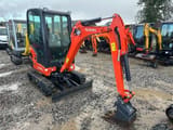 2023 Kubota KX019-4 mini excavator, front three-quarter view
