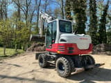 2018 Takeuchi TB295W wheel excavator, rear three-quarter view