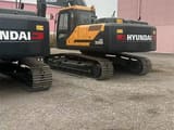 2023 Hyundai HX220S crawler excavator, rear three-quarter view