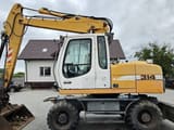 2010 Liebherr A314 wheel excavator, side profile view