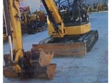 2018 Caterpillar 305.5E2 crawler excavator, front three-quarter view