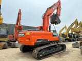 2023 Doosan DX225LC-9C crawler excavator rear three-quarter view