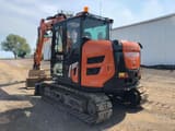 2023 Hitachi ZX95USBRP-7 crawler excavator, rear three-quarter view