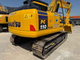 2020 Komatsu PC110 crawler excavator, rear three-quarter view