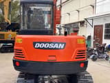2023 Doosan DX55-9C mini excavator, rear view