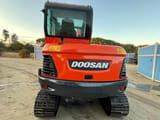 2022 Doosan DX60 mini excavator, rear view