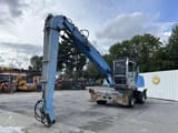 2011 Fuchs MHL335 material handler, side view