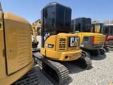 2022 Caterpillar 304CR mini excavator, rear three-quarter view
