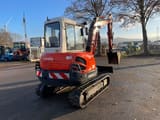 2010 Kubota KX121-3 mini excavator, rear three-quarter view