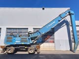 2015 Fuchs MHL350E material handler, side profile view