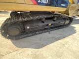 2016 Caterpillar 330DL crawler excavator undercarriage view