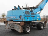 2017 Fuchs MHL340 wheel excavator, rear three-quarter view
