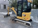 2023 Caterpillar 302 mini excavator, three-quarter view