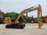 2023 Caterpillar 320GC crawler excavator side view