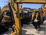 2020 Caterpillar 303.5E mini excavator boom and bucket detail