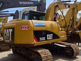 2022 Caterpillar 312D excavator, rear three-quarter view