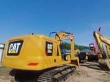 2022 Caterpillar 320GC crawler excavator, rear three-quarter view