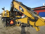 Caterpillar M316D wheel excavator, side view