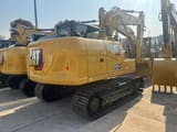 2026 Caterpillar 312GC crawler excavator, rear three-quarter view