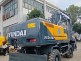 2024 Hyundai R210W-9S wheel excavator, rear three-quarter view