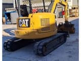 2018 Caterpillar 305.5E2 crawler excavator, rear three-quarter view