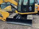 2023 Caterpillar 307E2 crawler excavator, front three-quarter view