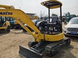 2023 Komatsu PC30 mini excavator, rear three-quarter view
