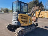 2010 Komatsu PC50MR-2 mini excavator, rear three-quarter view