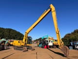 1994 Komatsu PC120-6 crawler excavator, side view with long reach boom